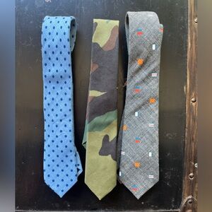 Crewcuts ties 42" good for ages 2-7.  Set of 3